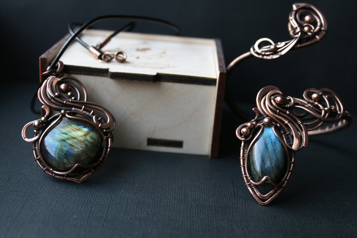 Handcrafted copper wire wrapped labradorite necklace and bracelet.